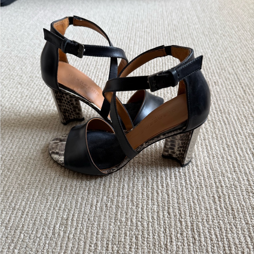 Clergerie black heels! Snakeskin detail and the toe and metal heel